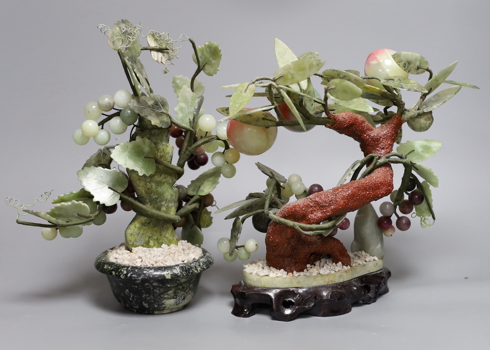 Two Chinese hardstone model trees, peach tree 27cms high